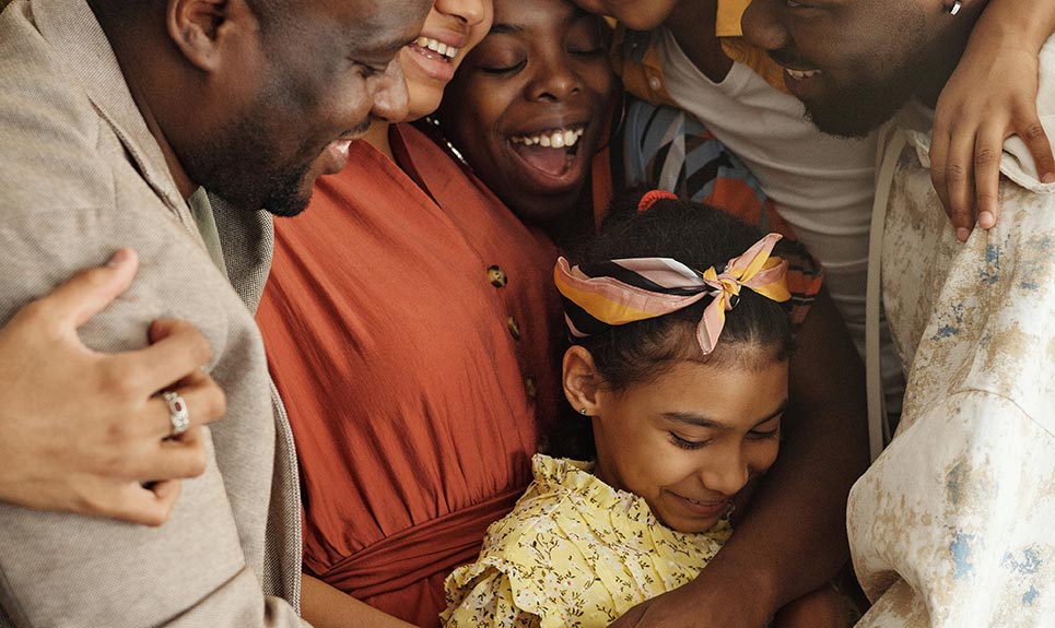 A community of people hugging