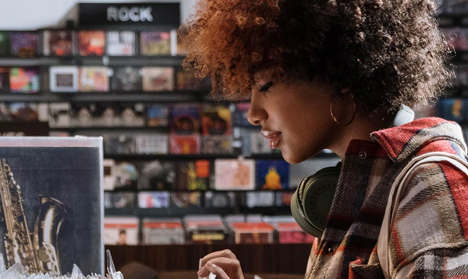 A young lady shopping in a music store