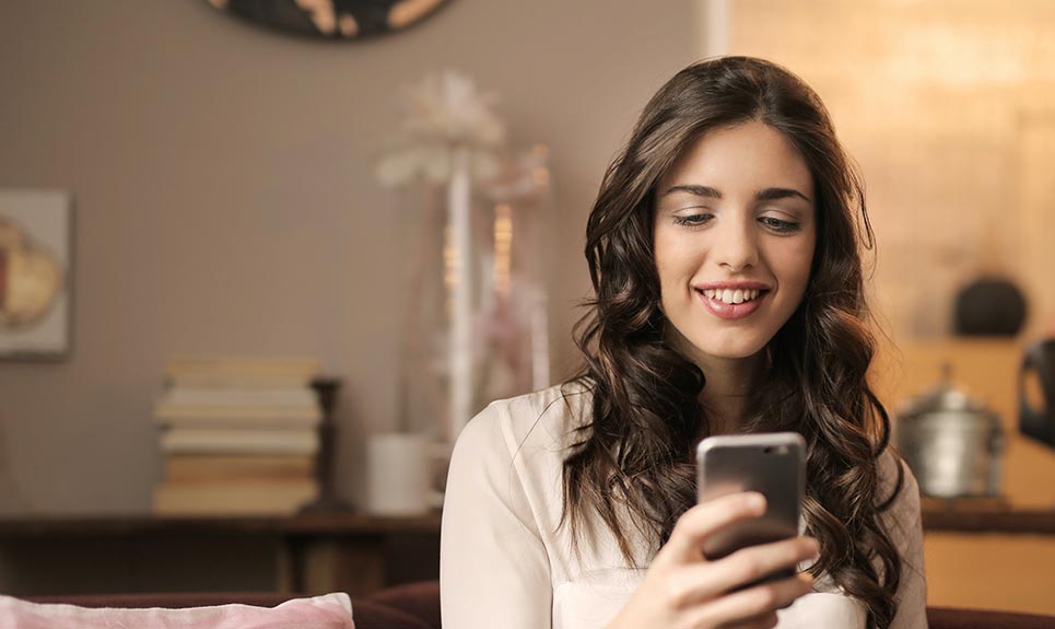 A young lady using a smartphone