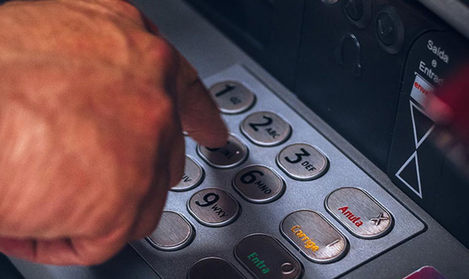 Man using an ATM